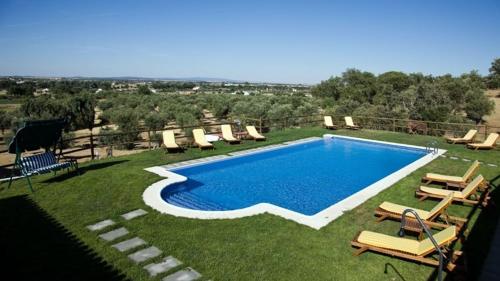 Swimmingpoolen hos eller tæt på Hotel Quinta Dos Bastos