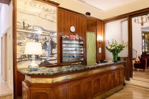 a large kitchen with a large counter top at Hotel Continental in Treviso