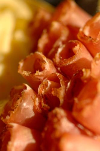 a close up of a pile of donuts at Aparthotel Garni Monte in Kartitsch
