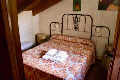 Cama o camas de una habitación en Casas Rurales Quijote y Sancho
