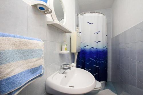 Kúpeľňa v ubytovaní Robinson Delphinus