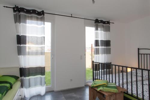 Postel nebo postele na pokoji v ubytování Apartments "Happy Family"