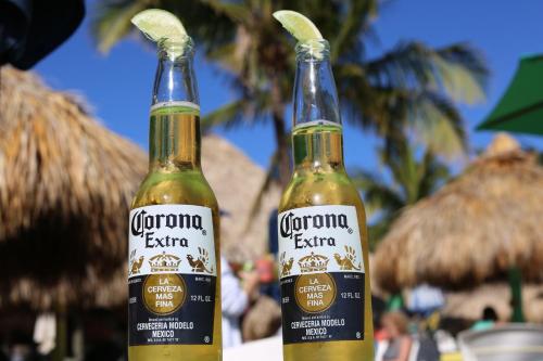 two bottles of corona beer sitting on a table at Gilbert's Resort in Key Largo