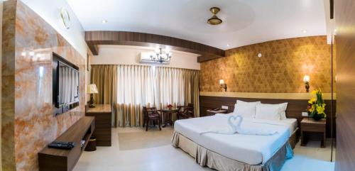Postel nebo postele na pokoji v ubytování Hotel Grace Majestic