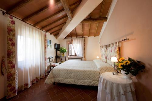 Postel nebo postele na pokoji v ubytování Cavarchino B&B