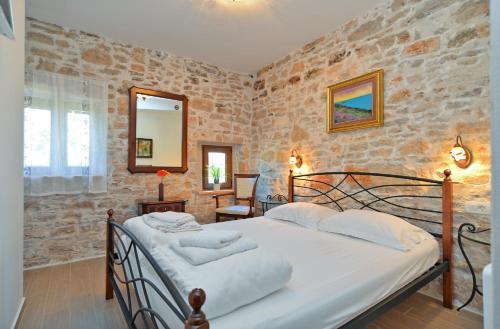 Ένα ή περισσότερα κρεβάτια σε δωμάτιο στο House Marko 1240