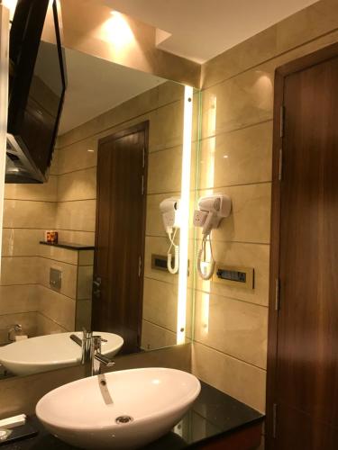 Koupelna v ubytování JRD Pride-Business Hotel