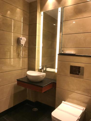 Koupelna v ubytování JRD Pride-Business Hotel