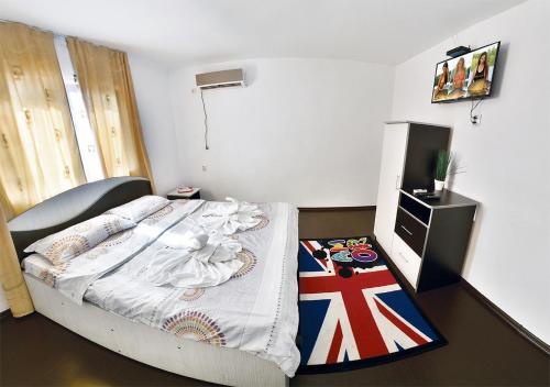 Postel nebo postele na pokoji v ubytování Casa ERIC