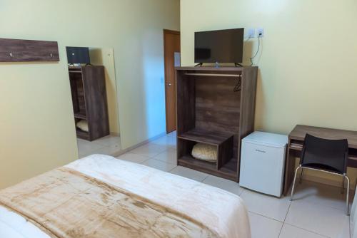 Televisyen dan/atau pusat hiburan di Hotel D'Nápoles