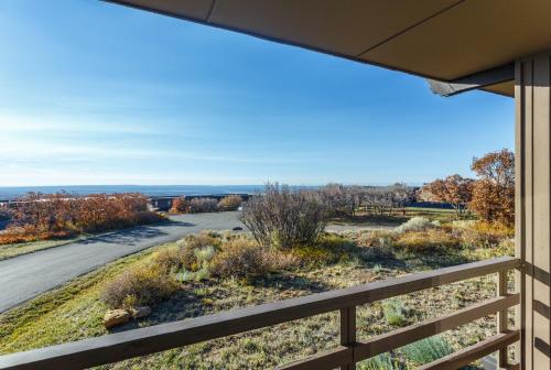 a view from the balcony of a house overlooking the ocean at Far View Lodge in Mesa Verde National Park