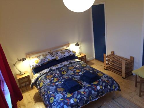 Postel nebo postele na pokoji v ubytování Ardminish House Gigha