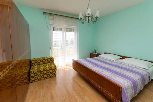 Postel nebo postele na pokoji v ubytování Apartment Lele
