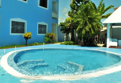 Bazén v ubytování Hotel Maracas Punta Cana nebo v jeho okolí