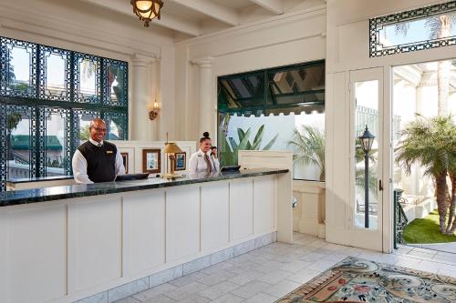 a kitchen with a large counter top and a large window at Glorietta Bay Inn in San Diego
