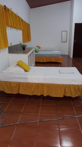 Postel nebo postele na pokoji v ubytování Casa Brenes