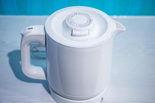 a white blender sitting on top of a table at Cococious Monpa in Chatan