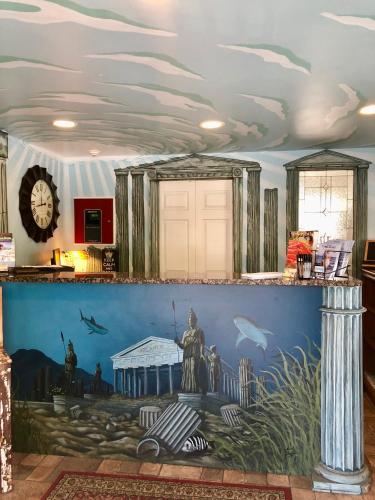 a mural on a wall in a room at Atlantis Inn - Tybee Island in Tybee Island