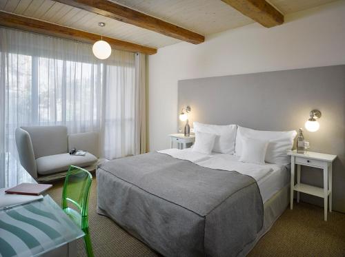 Postel nebo postele na pokoji v ubytování Hotel La Romantica