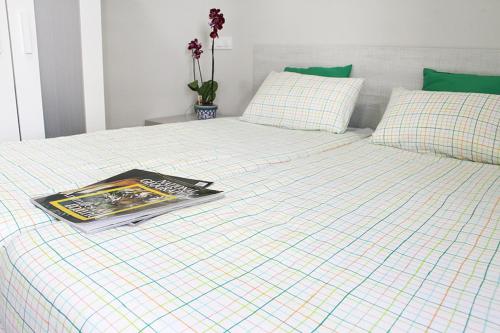 Ένα ή περισσότερα κρεβάτια σε δωμάτιο στο Apartamentos Logroño Centro