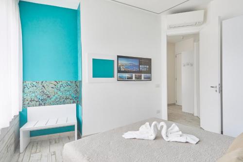 מיטה או מיטות בחדר ב-Luxury Experience | WelcHome Napoli