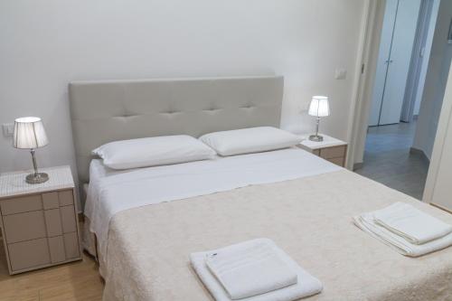 En eller flere senge i et værelse på Majoorel (near San Marco)