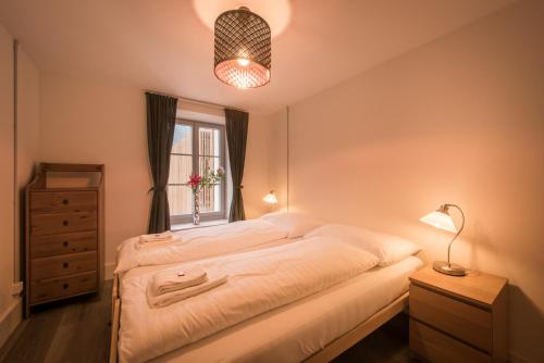 Ένα ή περισσότερα κρεβάτια σε δωμάτιο στο Dependance Penthouse