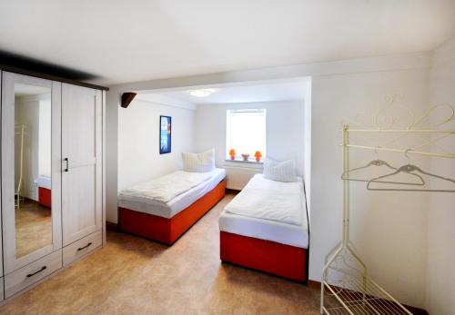 Een bed of bedden in een kamer bij Ferienwohnung Zittau