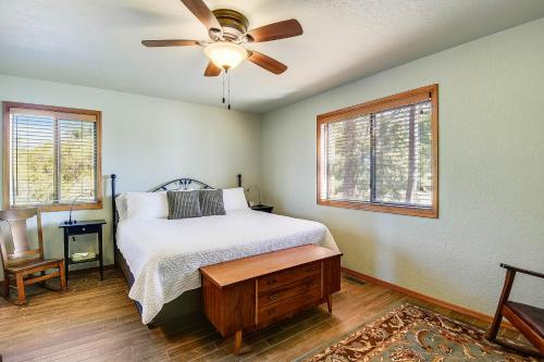 a bedroom with a bed and a ceiling fan at Pine Vista in Pagosa Springs