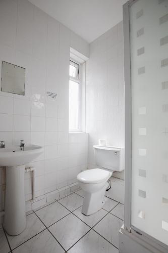 Ein Badezimmer in der Unterkunft Dunes Hotel