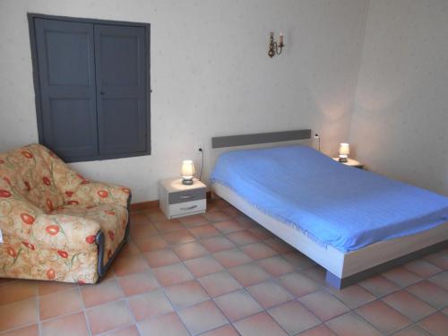 Un pat sau paturi într-o cameră la MAS PROVENCAL LE ROCAn