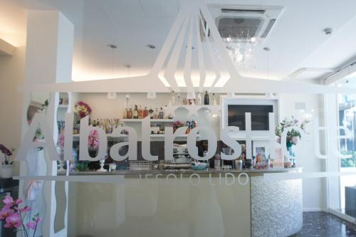 a store with a sign that reads a boutique at Hotel Albatros 3 Stelle Superior in Lido di Jesolo