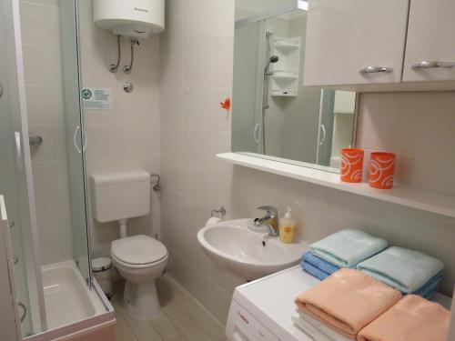 Koupelna v ubytování Apartments Kuzmanic