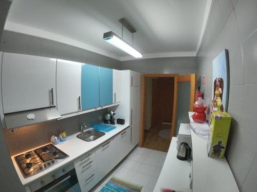 Virtuvė arba virtuvėlė apgyvendinimo įstaigoje Sea & City