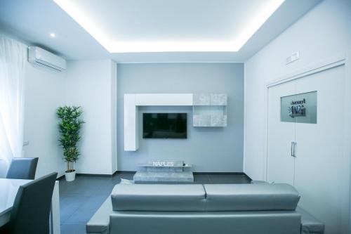 TV a/nebo společenská místnost v ubytování Benvenuti al Sud Naples