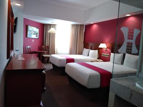 Katil atau katil-katil dalam bilik di Hotel Lois Veracruz