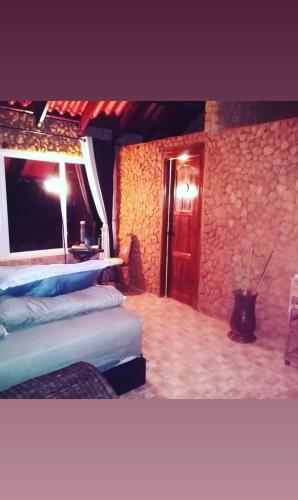 Ένα ή περισσότερα κρεβάτια σε δωμάτιο στο Mandalas Ecolodge Ecotourismo Altos Cerro Azul, Rain Forest Natural,Chagres National Park