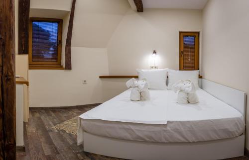 Llit o llits en una habitació de Central Loft