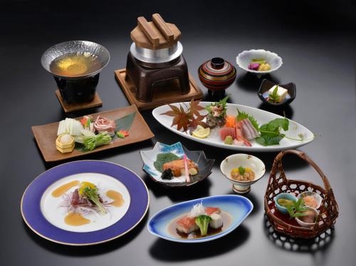 a group of plates of food on a table at Le Nessa Akazawa in Ito