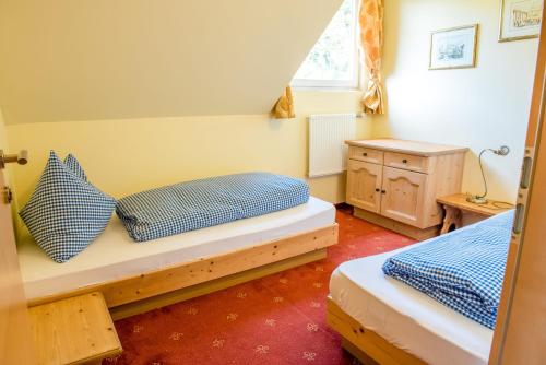 Posteľ alebo postele v izbe v ubytovaní Hütte zum Verlieben