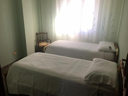 Ένα ή περισσότερα κρεβάτια σε δωμάτιο στο Casa Nicolangelo