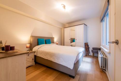 Letto o letti in una camera di Apartment Kursaal Ostend