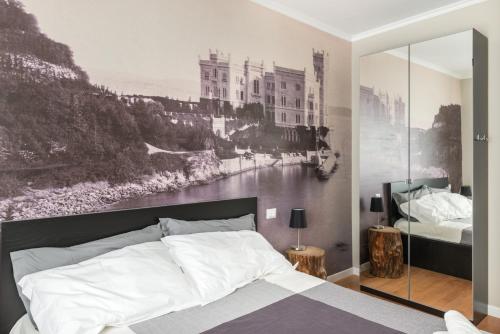 Ένα ή περισσότερα κρεβάτια σε δωμάτιο στο Garibaldino Rooms