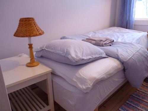 Un ou plusieurs lits dans un hébergement de l'établissement Uppe på Vinden