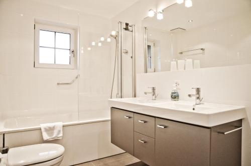 Phòng tắm tại Apartment Felix - GRIWA RENT AG