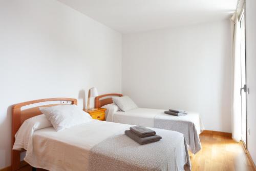 Postel nebo postele na pokoji v ubytování Lets Holidays apartment Ancora 5