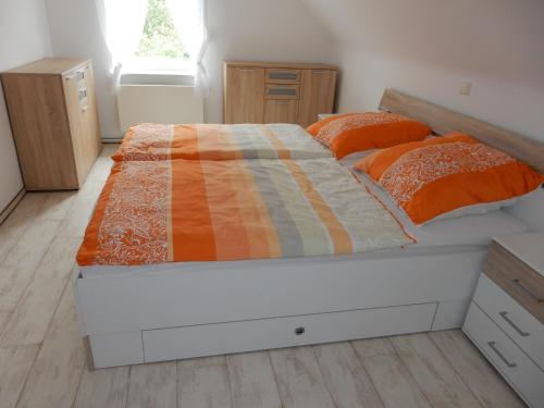 Katil atau katil-katil dalam bilik di Ferienwohnung Gänseblümchen