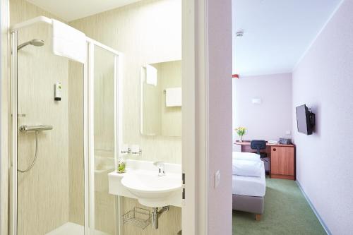 Koupelna v ubytování Hotel Anhalt