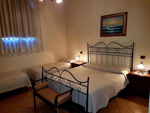 Ein Bett oder Betten in einem Zimmer der Unterkunft Hotel Scalinatella