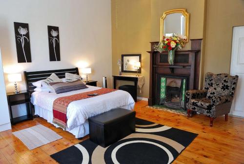 Postel nebo postele na pokoji v ubytování Tranquil Guest House